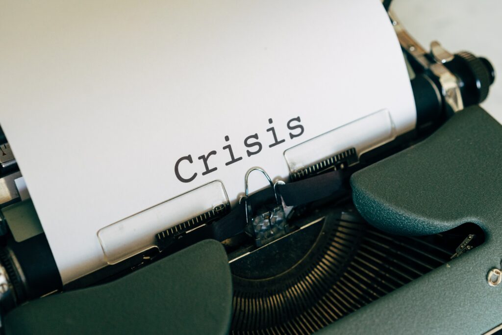 Crisis - paper on vintage typewriter